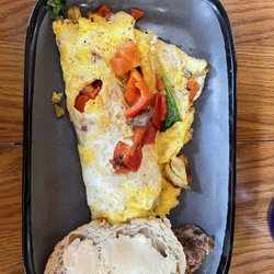 Cafe  Appalachia - Omelet with sausage and sourdough bread with honey butter