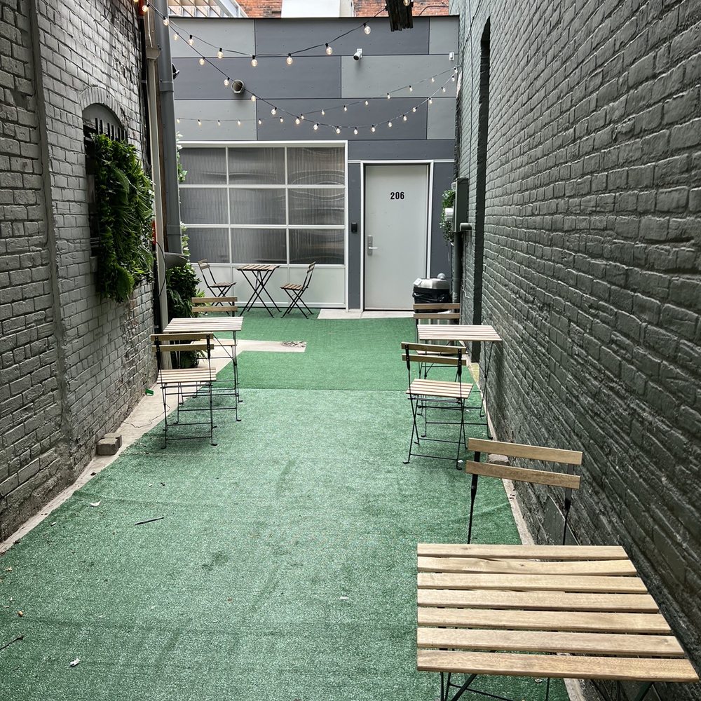 Outdoor seating behind the building