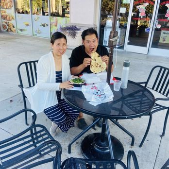Punjabi Tandoor - Garlic Nan, eating outside in courtyard next to AMC - Indian Near Me - Norwalk, California Punjabi Tandoor - Garlic Nan, eating outside in courtyard next to AMC - Indian Near Me - Norwalk, California