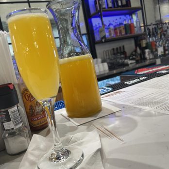 Eggspectation - Gambrills - Pitcher of peach mimosa - Breakfast & Brunch Near Me - Gambrills, Maryland