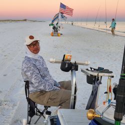 Tom fishing on Navarre Beach
