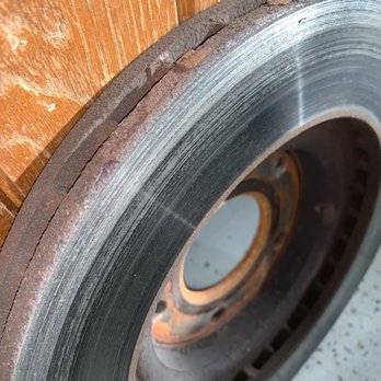 Firestone Complete Auto Care - Rusted rotor and brake pads with no pads whatsoever - Tires Near Me - Naperville, Illinois