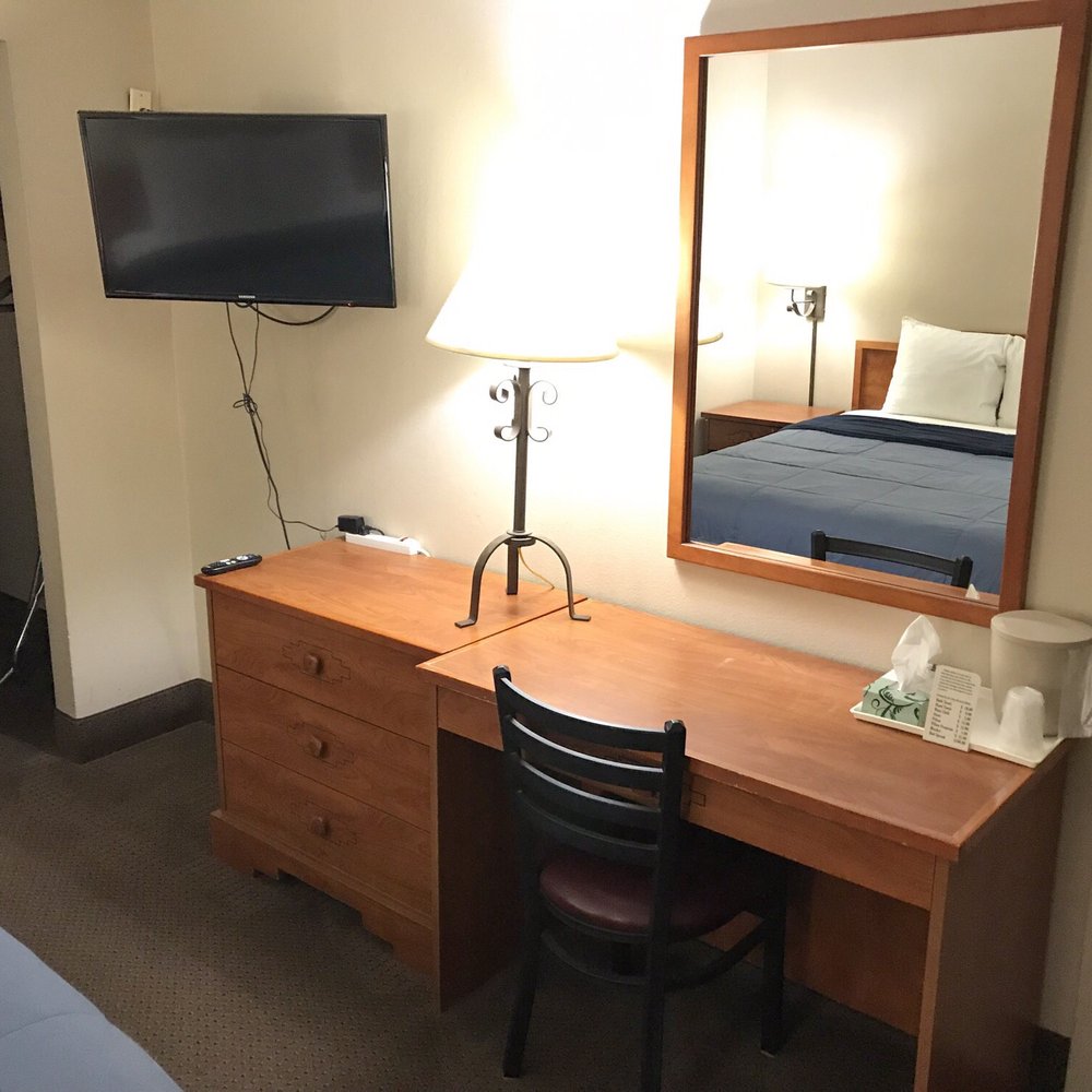 Regency Inn and Suites - Plenty of lighting in the room and a desk if you need to do some work. - Hotels Near Me - Dodge City, Kansas Regency Inn and Suites - Plenty of lighting in the room and a desk if you need to do some work. - Hotels Near Me - Dodge City, Kansas