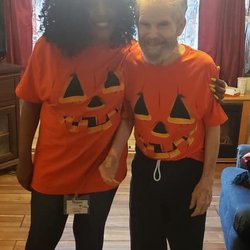 Senior Helpers - Our Caregiver, Gretta, dressed up as a pumpkin with her client for Halloween!
