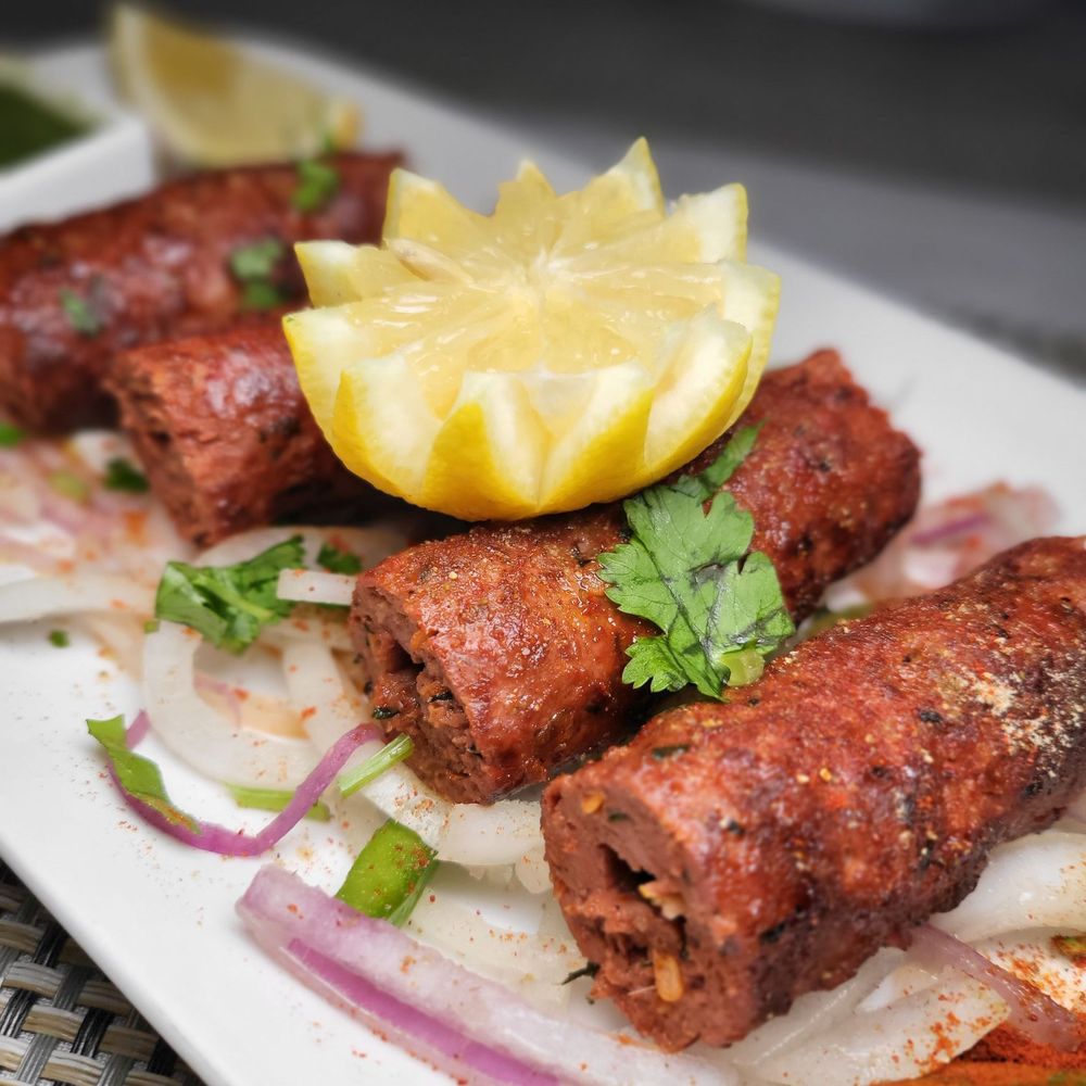 Lungi - a plate of food - Cocktail Bars Near Me - New York, New York Lungi - a plate of food - Cocktail Bars Near Me - New York, New York