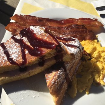 Lido Cafe - Strawberry stuffed French toast w/scrambled eggs & 2 strips of bacon - Comfort Food Near Me - Carmichael, California Lido Cafe - Strawberry stuffed French toast w/scrambled eggs & 2 strips of bacon - Comfort Food Near Me - Carmichael, California
