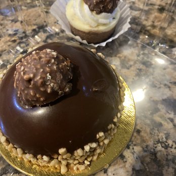 Baklovah Bakery - Ferrero Rocher Mousse dome & cheesecake in back - Desserts Near Me - San Antonio, Texas Baklovah Bakery - Ferrero Rocher Mousse dome & cheesecake in back - Desserts Near Me - San Antonio, Texas
