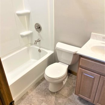 D W Planker - a bathroom with a toilet and bathtub - General Contractors Near Me - Greenwood, Indiana D W Planker - a bathroom with a toilet and bathtub - General Contractors Near Me - Greenwood, Indiana