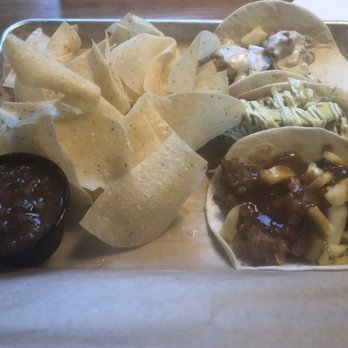Strange Taco Bar - Left. chips and salsa. Right top to bottom: coconut fried shrimp, b-atl, jerk fried chicken - Tacos Near Me - Lawrenceville, Georgia Strange Taco Bar - Left. chips and salsa. Right top to bottom: coconut fried shrimp, b-atl, jerk fried chicken - Tacos Near Me - Lawrenceville, Georgia