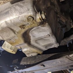 Acme Oil & Lube - Clearly you can see oil dripping from the filter
