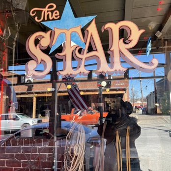The Star Cafe - a window with a sign in the window - Burgers Near Me - Fort Worth, Texas