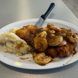 Bbq shrimp over chicken and mashed potatoes