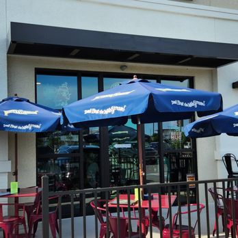 Florida Tap House - Outdoor smoking & dining area. - Burgers Near Me - Venice, Florida