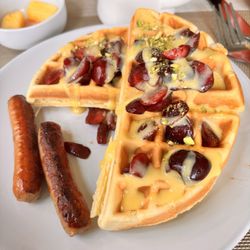 Campbell House Inn - Waffles with pistachio, fresh cherries and apple chicken sausage