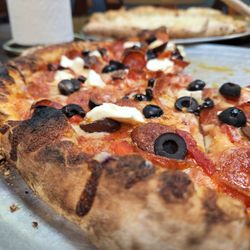 Center Fire Pizza - Double pepperoni, black olives, kalamata olives, cream cheese, roasted red peppers and onion
