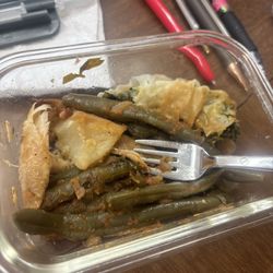 Might not look  good but these left overs are delicious !  1/4 Greek Chicken Spanakotiropita Side Fasolakia