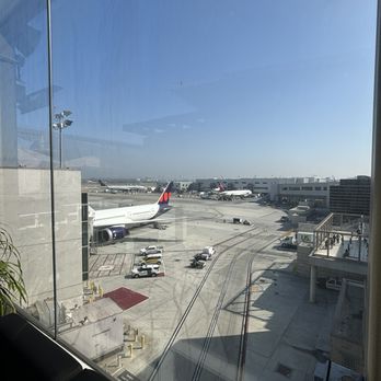Star Alliance Lounge - View of Delta planes and terminal - Airport Lounges Near Me - Los Angeles, California