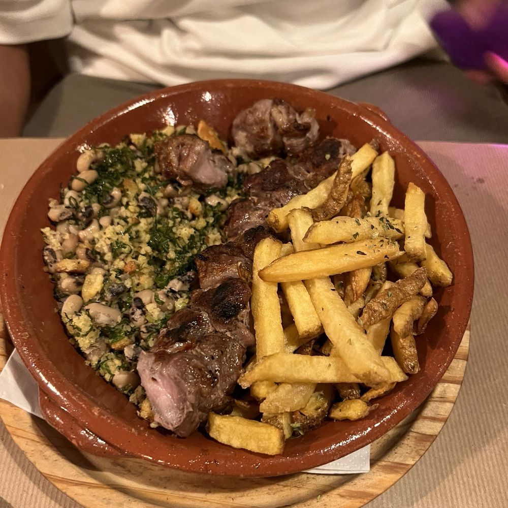 Chapitô à Mesa - Pork with fries and a bean salad. The pork was tender and the fries were good. - Portuguese Near Me - Lisbon, 11