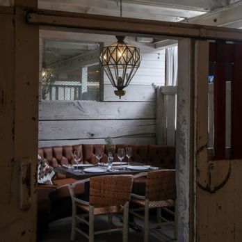 Barn8 - One of their converted barn stalls made into seating areas - New American Near Me - Goshen, Kentucky