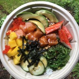 Large Poke Bowl Rice Large with kani, salmon, avocado, cucumber, mango, seaweed salad, roasted seaweed, masago and eel sauce Large Poke Bowl Rice Large with kani, salmon, avocado, cucumber, mango, seaweed salad, roasted seaweed, masago and eel sauce