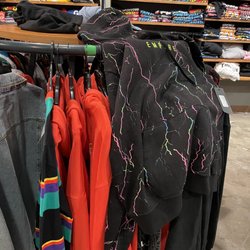 Hoodies layed out everywhere so the employees can show their hard work of maintaining this awesome store