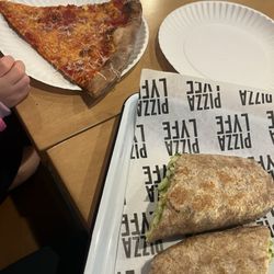 Pizza Lyfe - Cheese pizza slice, chicken Cesar wrap