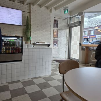 Spaghetti Western - The entrance and the two types of seating. - Italian Near Me - Toronto, Ontario