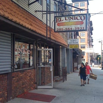 El Unico Restaurant - two people walking down the sidewalk - Latin American Near Me - Union City, New Jersey El Unico Restaurant - two people walking down the sidewalk - Latin American Near Me - Union City, New Jersey