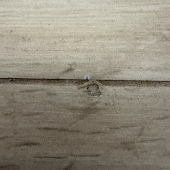 Zona Floors - Covered up with silicone. - Flooring Near Me - Tempe, Arizona Zona Floors - Covered up with silicone. - Flooring Near Me - Tempe, Arizona