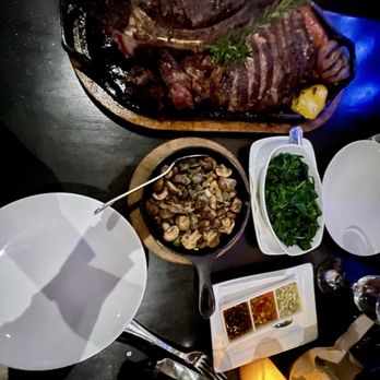Malbec Argentinean Cuisine - Rib eye and tomahawk Mushrooms and spinach - Argentine Near Me - Pasadena, California Malbec Argentinean Cuisine - Rib eye and tomahawk Mushrooms and spinach - Argentine Near Me - Pasadena, California