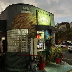 Mediterranean Street Food by Shishco - Front of Restaurant- window where you order, outdoor seating. In Maitland