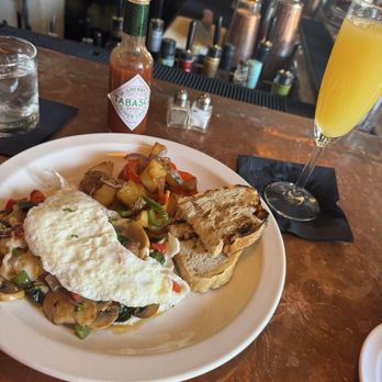 Malbec Argentine Steakhouse - Egg White Omelette, home fries and toasted bread - Argentine Near Me - Philadelphia, Pennsylvania Malbec Argentine Steakhouse - Egg White Omelette, home fries and toasted bread - Argentine Near Me - Philadelphia, Pennsylvania