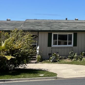 RZ Pro Painting - The body is Loggia, trim Courtyard (green) - Painters Near Me
