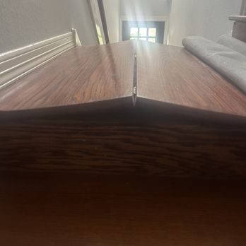 Evergreen Wood Flooring - Landing before repair - Flooring Near Me
