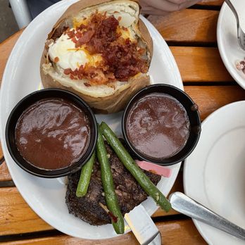 Best Little Roadhouse - Petite filet mignon and baked potato with two sauces. - Mini Golf Near Me - Salem, Oregon