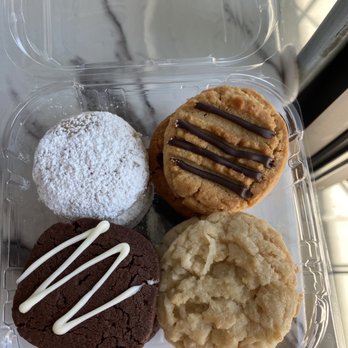 Cure Bakery & Coffee - Assorted cookie box--peanut butter, chocolate, oatmeal and Mexican wedding tea cake - Bakeries Near Me - Austin, Texas