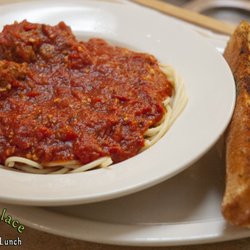 The Marketplace Cafe - Homemade Spaghetti Sauce over pasta with garlic bread.