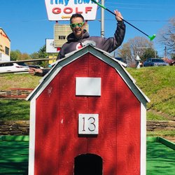 Tiny Town Miniature Golf - Happy because he got a hole in 1 on the Barn