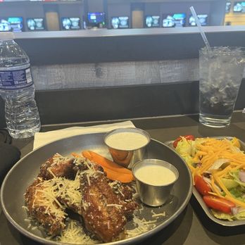 The League - Second night 6ct. Garlic Parmesan Bone-in wings fried extra crispy, side salad ($5), and their homemade Ranch Dressing. - Sports Bars Near Me - Durant, Oklahoma