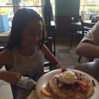 The Pancakery - Yes, the pancake was bigger than her! - Breakfast & Brunch Near Me - Destin, Florida