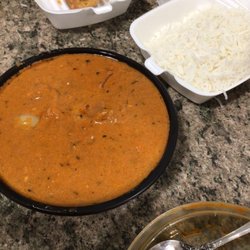 Curry Home - Total cost was $12.95 tiki , and -$ 4.99 Samosa with chicken.