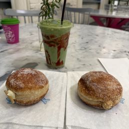 Lemon tiramisu donut, coconut donut, strawberry matcha, coffee Lemon tiramisu donut, coconut donut, strawberry matcha, coffee