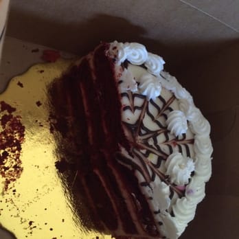 Frida's Cafe & Bakery - Cake was dry the cream cheese tasted old and nobody could eat,,1/2 of the cake went straight in the trash... - Bakeries Near Me - Largo, Florida