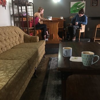 Coffee Cat Coffeehouse - Sofa seating in the back room and a table for those who want to work - Coffee & Tea Near Me - Newberg, Oregon