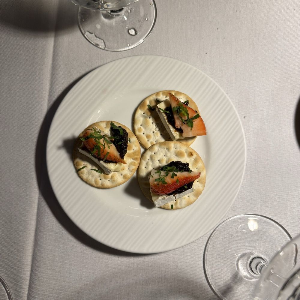 Marco's Kitchen - Amuse-bouche:  water cracker with Brie and fresh strawberries with balsamic glaze - French Near Me - La Grange, Illinois