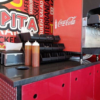 Pita Shop - a counter with a soda machine - Middle Eastern Near Me - Hollywood, Florida Pita Shop - a counter with a soda machine - Middle Eastern Near Me - Hollywood, Florida