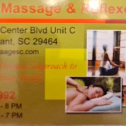 Orchid Massage & Reflexology - This is the business card I picked up after I paid for the foot massage service at the register.