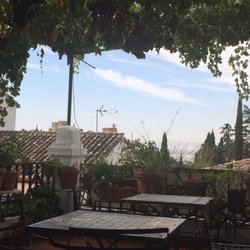 Escuela Carmen de Las Cuevas - View from one of the school's terraces. In the mornings they set out their fresh grapes.