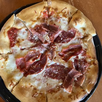 CRÚ Food & Wine Bar - The Butcher pizza - Wine Bars Near Me - Austin, Texas CRÚ Food & Wine Bar - The Butcher pizza - Wine Bars Near Me - Austin, Texas