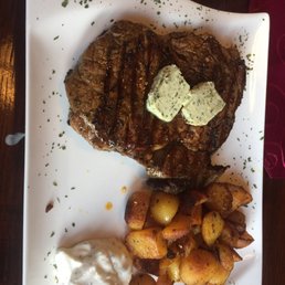 Rib eye XL with pan fried potatoes. Rib eye XL with pan fried potatoes.